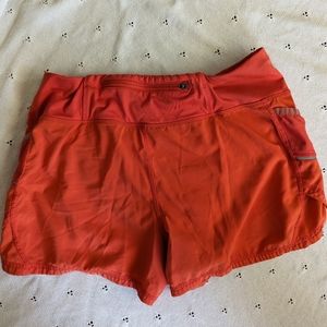 Athleta women's ready set go orange running workout shorts size small